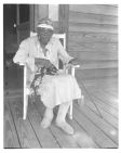 Elderly woman on porch